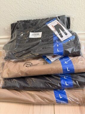 4 pack New women Pants - size L